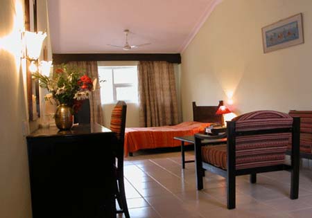 Hotel Coorg International  Bed Room