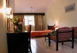 Hotel Coorg International  Bed Room