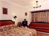 Deluxe Room,The Woods Manor-A heavenly stop-over,Business-Class hotels,India,Kerala,Kochi,3 star hotels,tour packages,Ayurveda,Conference facilities,Leisure Facilities,Kerala Tour  packages, Kerala Holidays, South India Tour Packages and  sight seeing. 