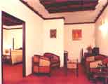 Suite Room,The Woods Manor-A heavenly stop-over,Business-Class hotels,India,Kerala,Kochi,3 star hotels,tour packages,Ayurveda,Conference facilities,Leisure Facilities,Kerala Tour  packages, Kerala Holidays, South India Tour Packages and  sight seeing.  