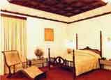 Kerala Suite,The Woods Manor-A heavenly stop-over,Business-Class hotels,India,Kerala,Kochi,3 star hotels,tour packages,Ayurveda,Conference facilities,Leisure Facilities,Kerala Tour  packages, Kerala Holidays, South India Tour Packages and  sight seeing.